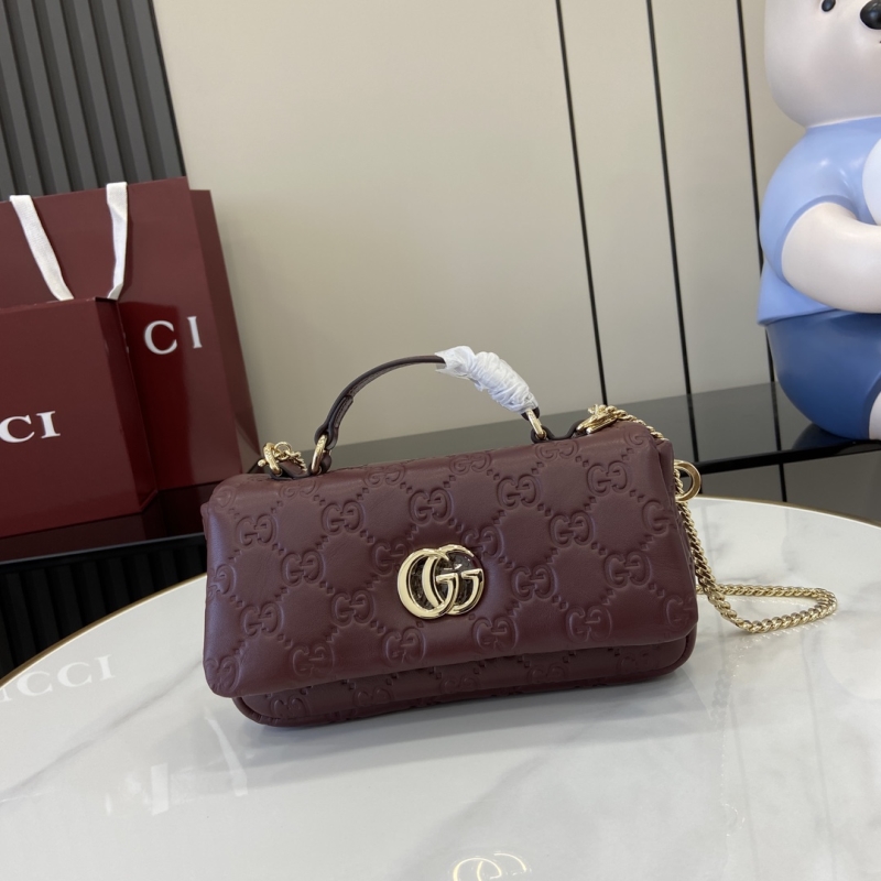 G*u*i top handle bags